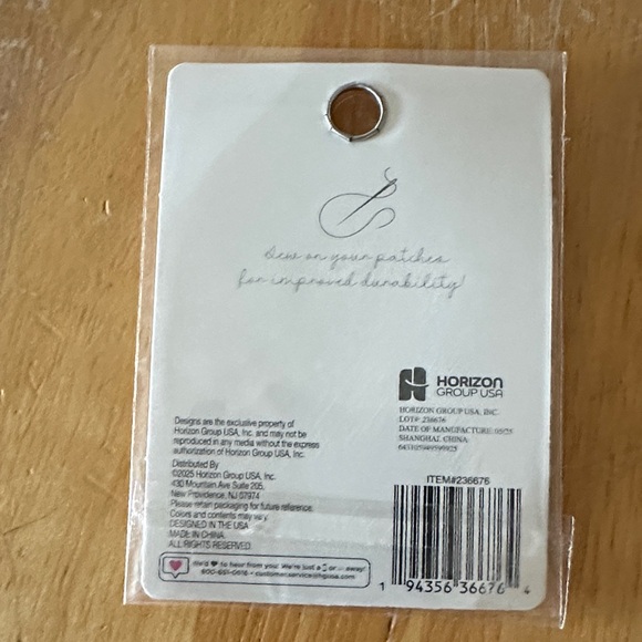 Tau—Gold and White Adhesive Patch - Picture 2 of 2